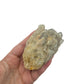 The 3.38 inch citrine cluster no. 30 shown in hand so its collector scale reads clearly.