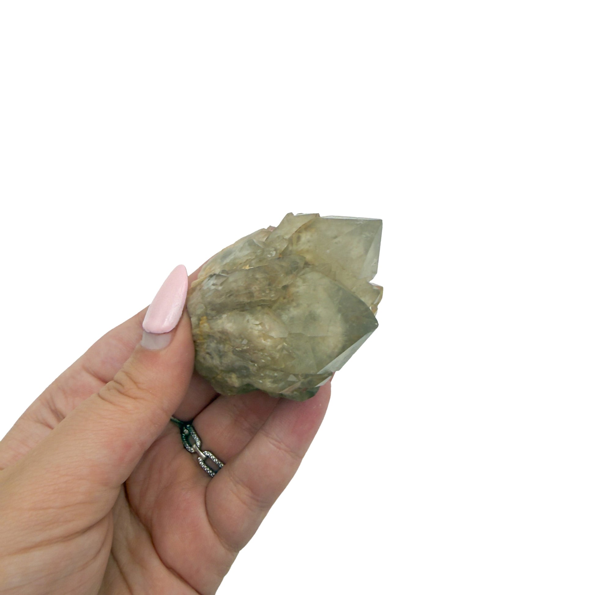 Scale reference for natural citrine no. 33: the 2.52 by 1.59 inch cluster resting in an open hand.