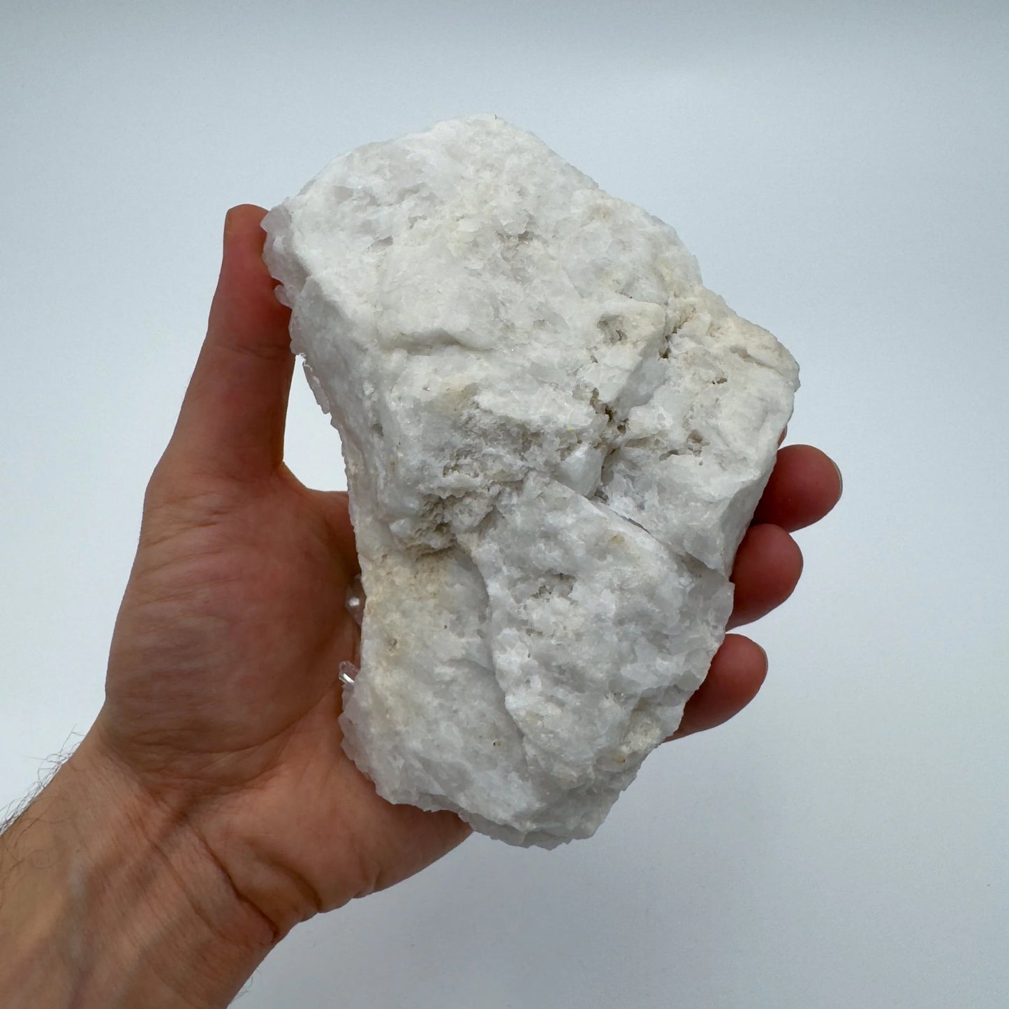 Back view of Grade AAA Clear Quartz specimen showing natural surface
