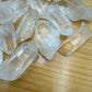 Macro view of Grade AA Clear Quartz raw point, carried for Cleansing and Meditation.