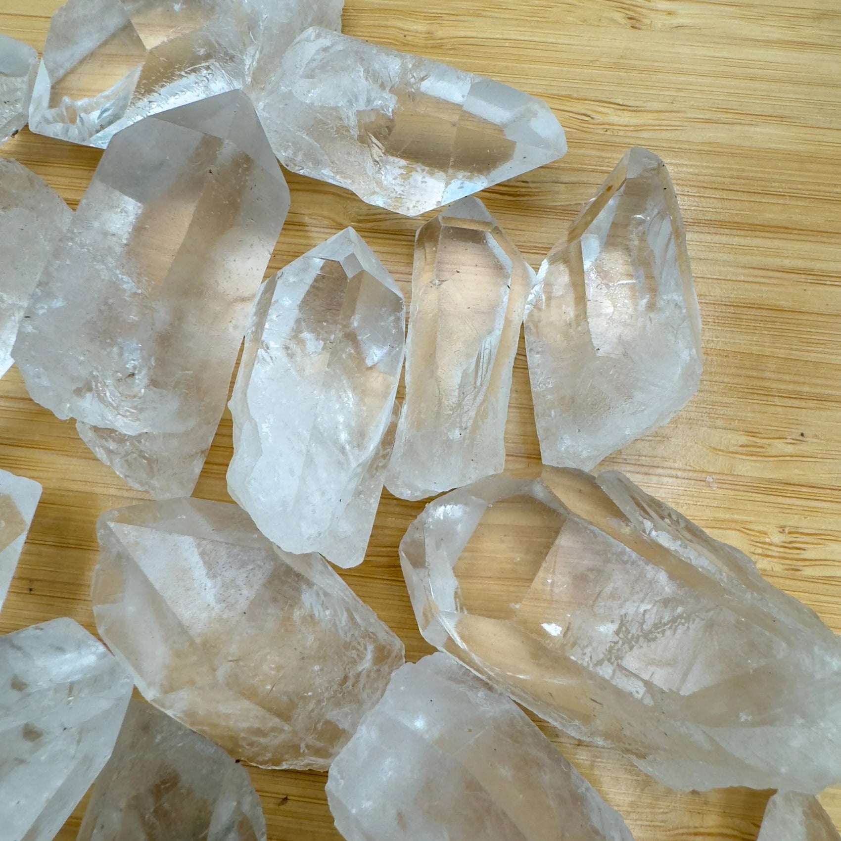 Bird's-eye view of Grade AA Clear Quartz raw point, showing natural texture.