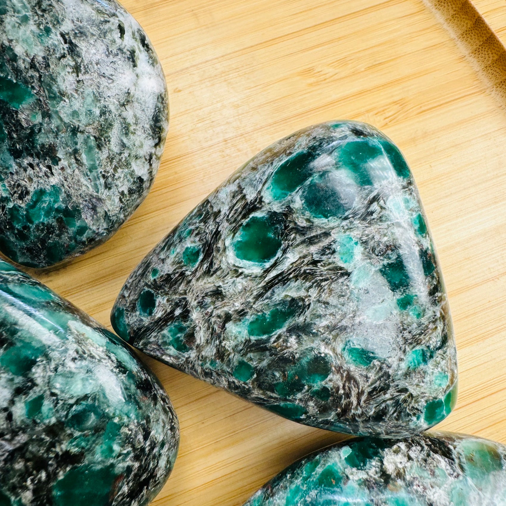 Emerald palm stone from Zimbabwe with Green color, polished finish for mindful calm
