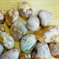 Plan view of Grade AA Flower Agate tumbled stone, showing natural sheen, worked with for Love.