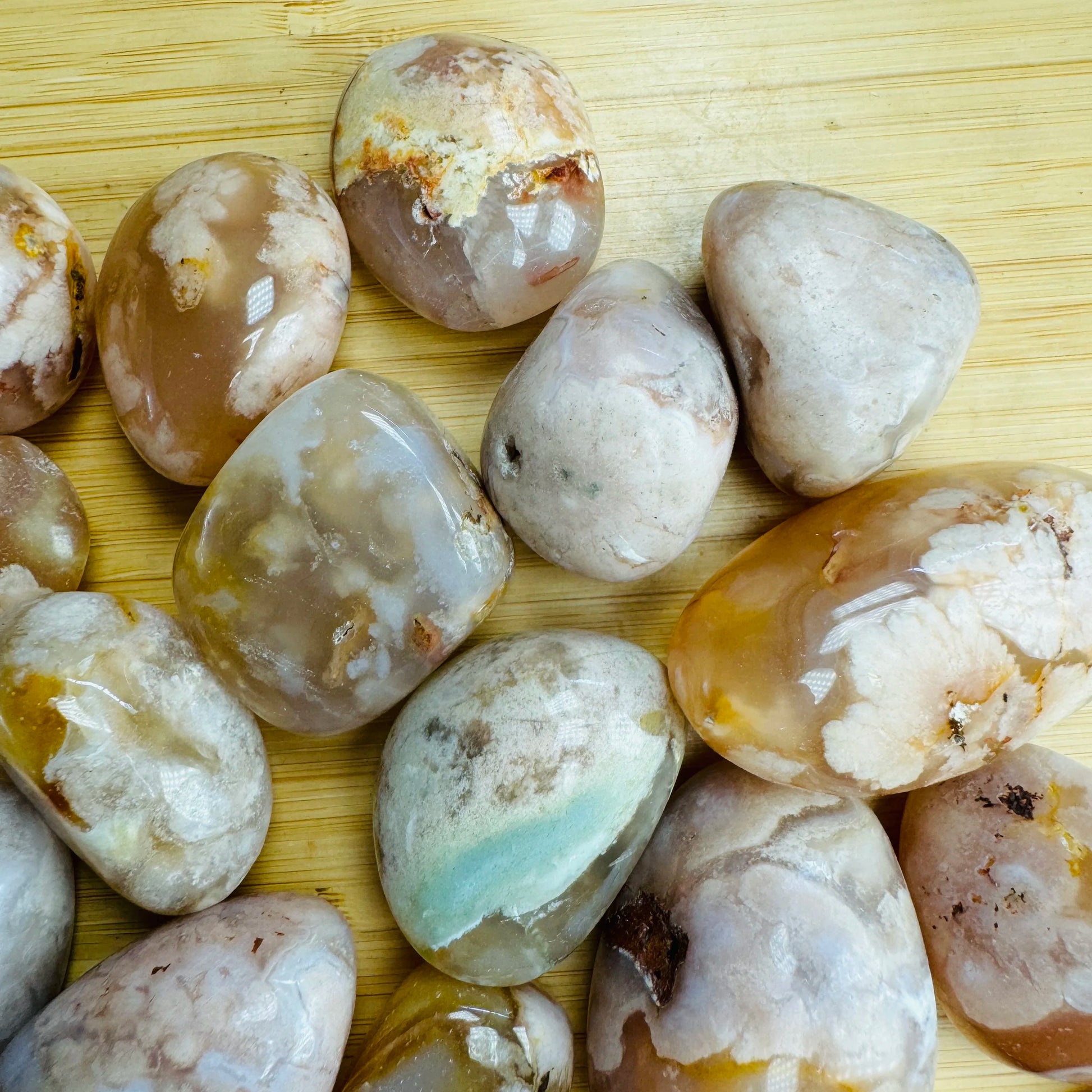 Plan view of Grade AA Flower Agate tumbled stone, showing natural sheen, worked with for Love.