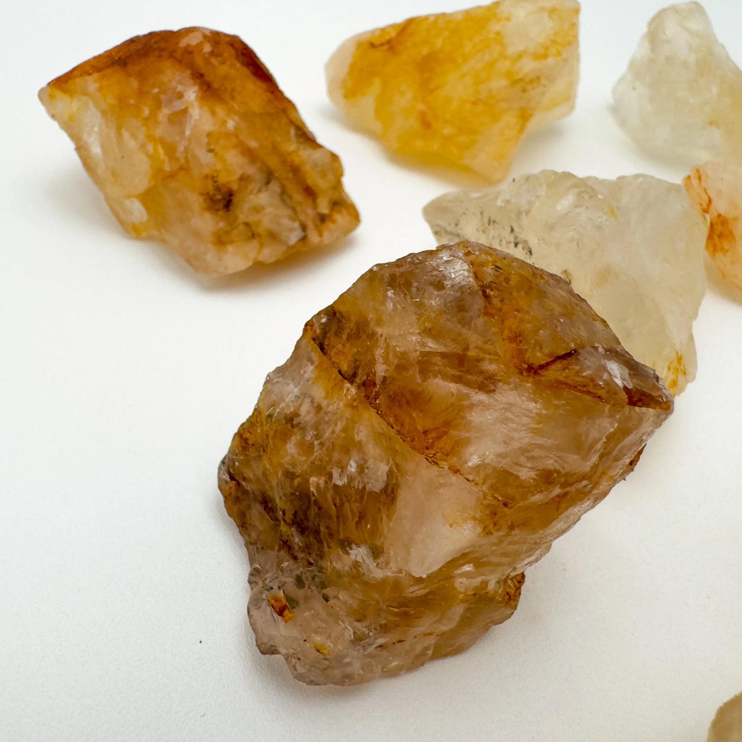 Top-down shot of Grade AA Golden Healer raw stone, Brazil-sourced, showing characteristic finish.