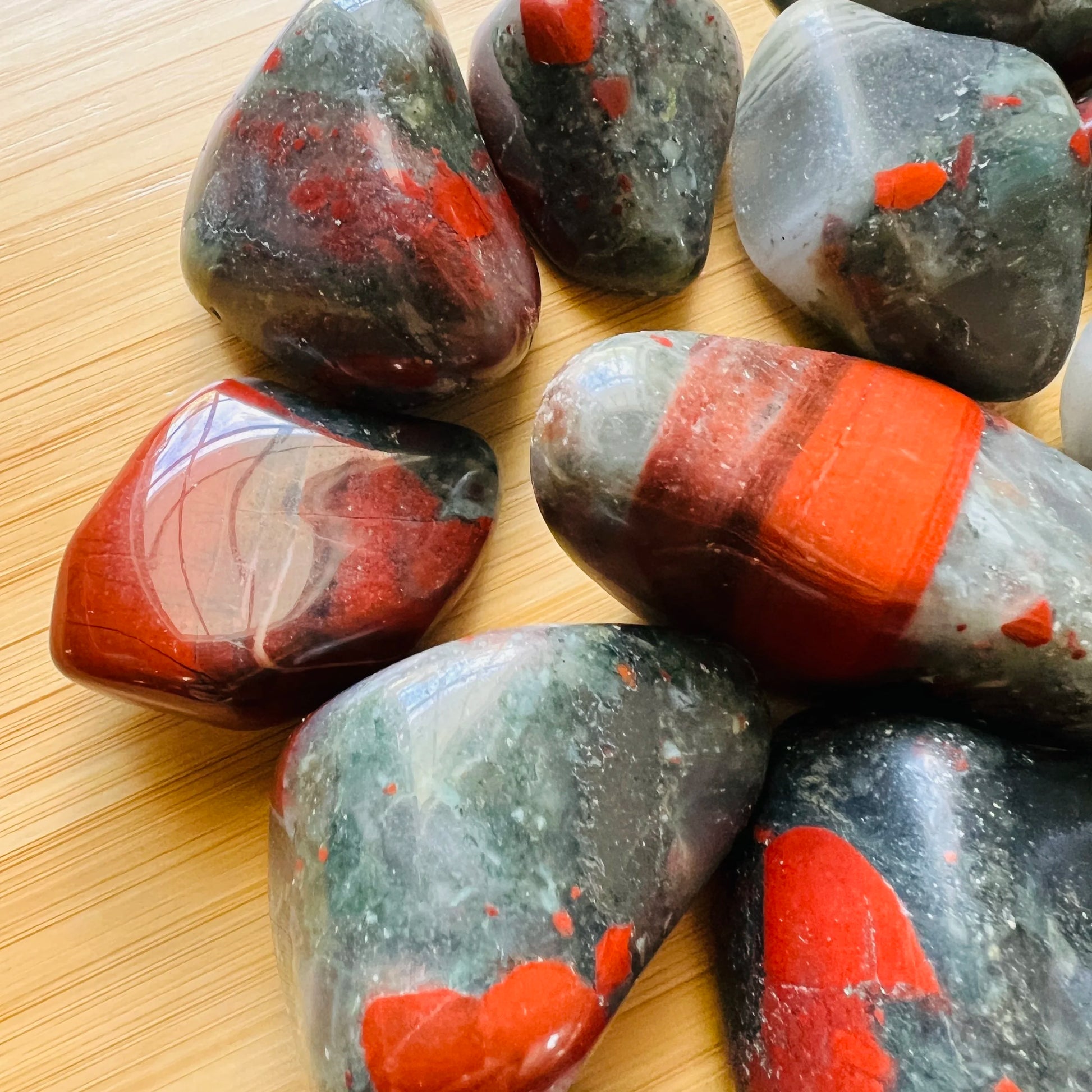 Full profile of Grade AA Bloodstone tumbled stone ready to ship from Beyond Bohemian