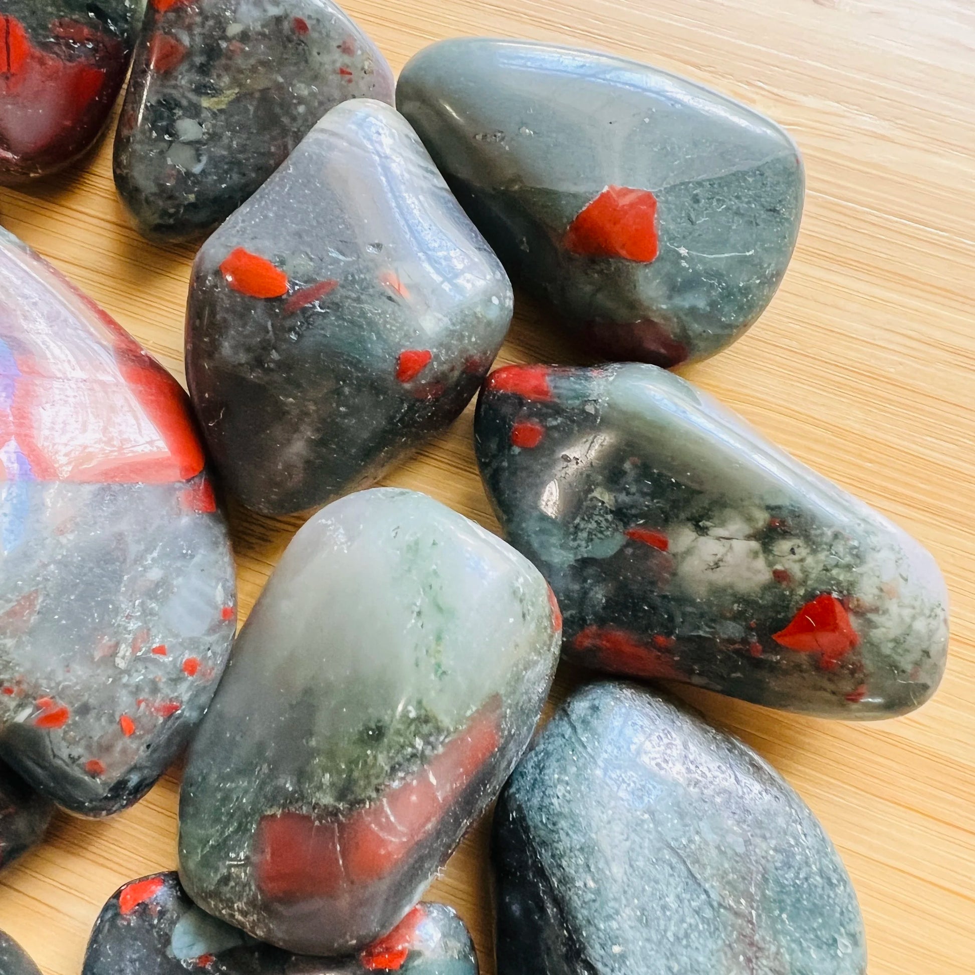 Full profile of Grade AA Bloodstone tumbled stone ready to ship from Beyond Bohemian