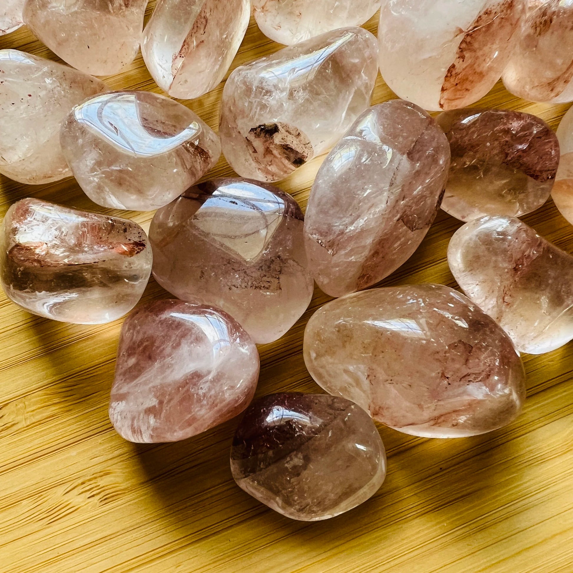 Back view of Grade AA Fire Quartz tumbled stone showing natural surface