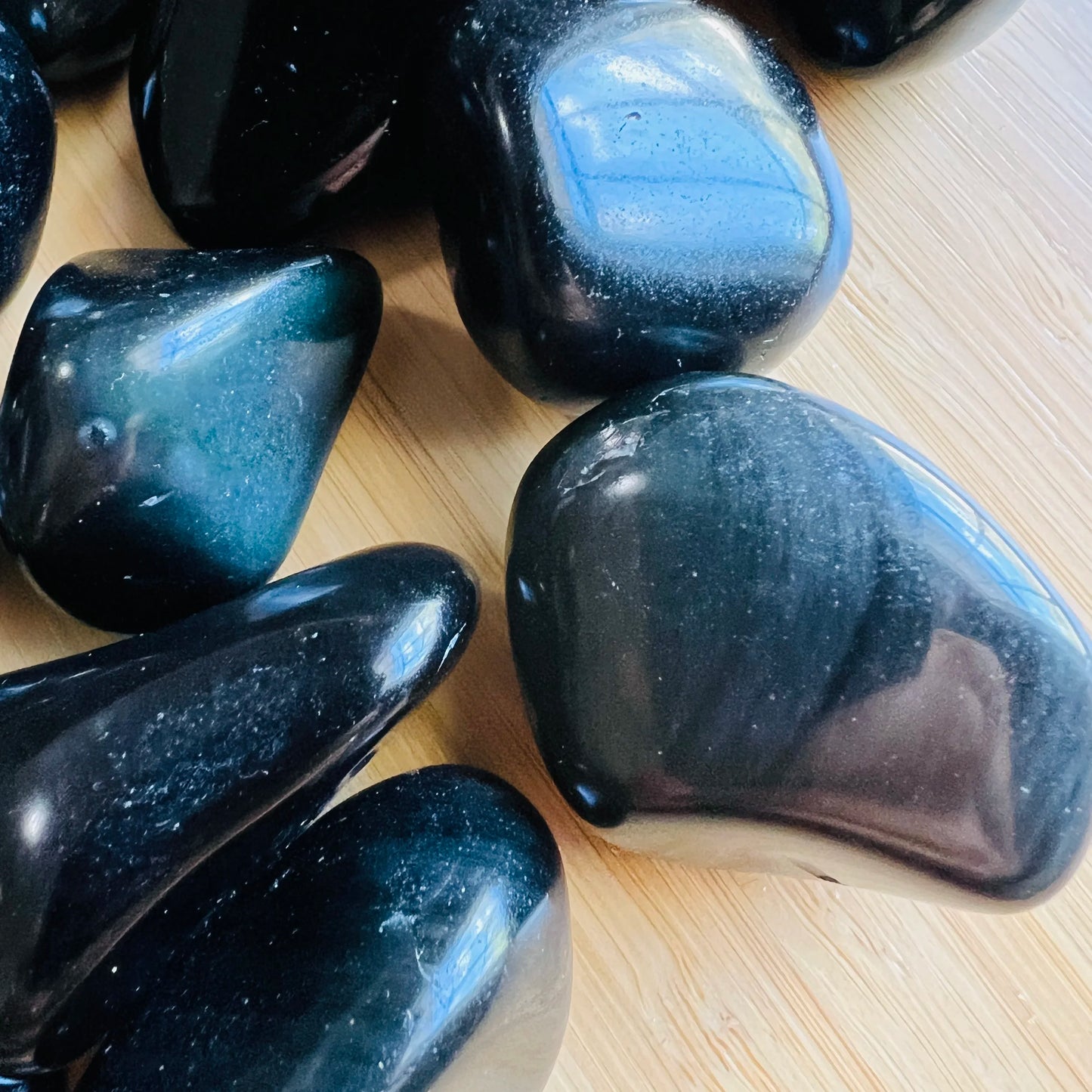 Full profile of Grade AA Rainbow Obsidian tumbled stone ready to ship from Beyond Bohemian