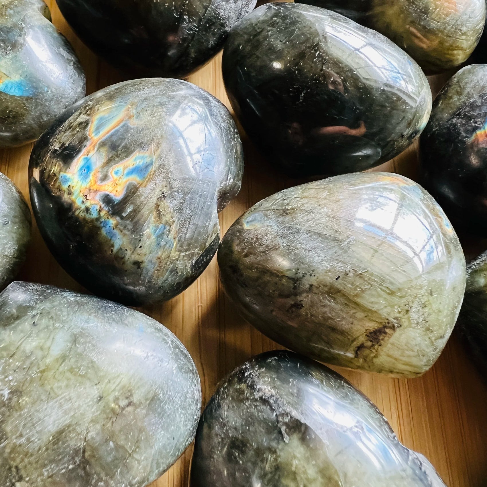 Opposite side of Labradorite polished heart, from Atsimo-Andrefana, Madagascar, showing natural texture.