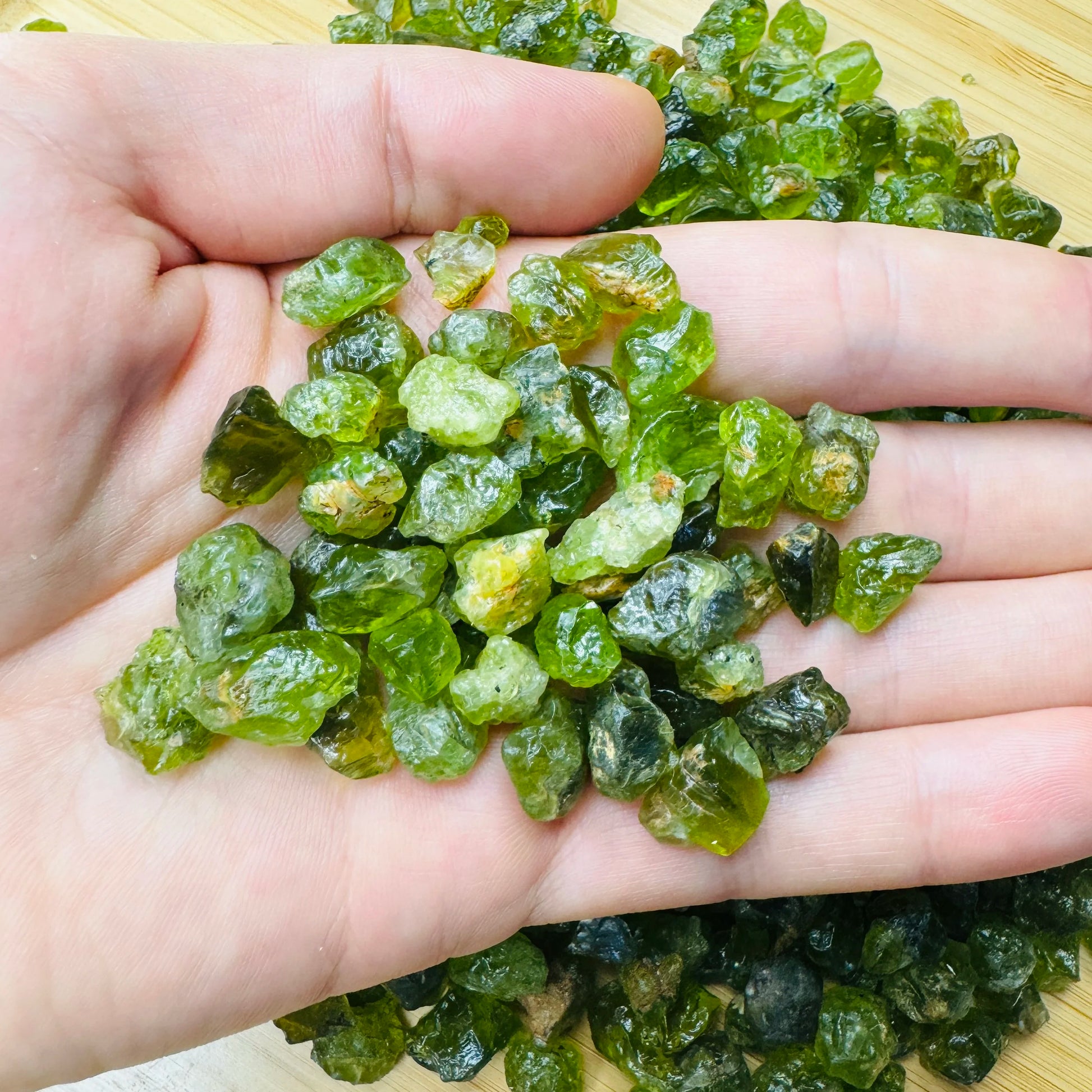 Near view of Peridot raw stone, for Abundance, showing earthy tone.