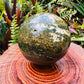 Back view of Grade AA Ocean Jasper sphere showing natural surface