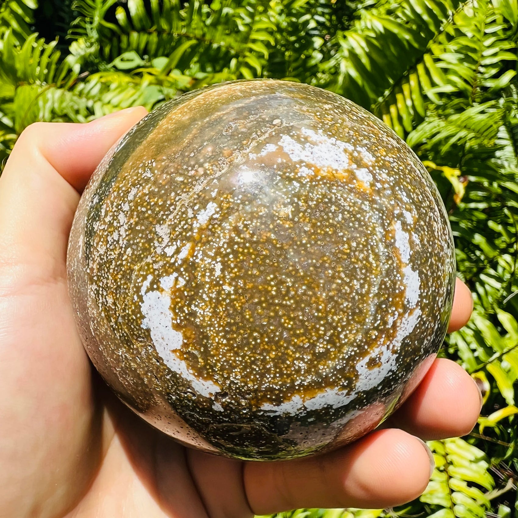 Underside detail of Grade AA Ocean Jasper polished sphere, from Madagascar, for Emotional Healing.