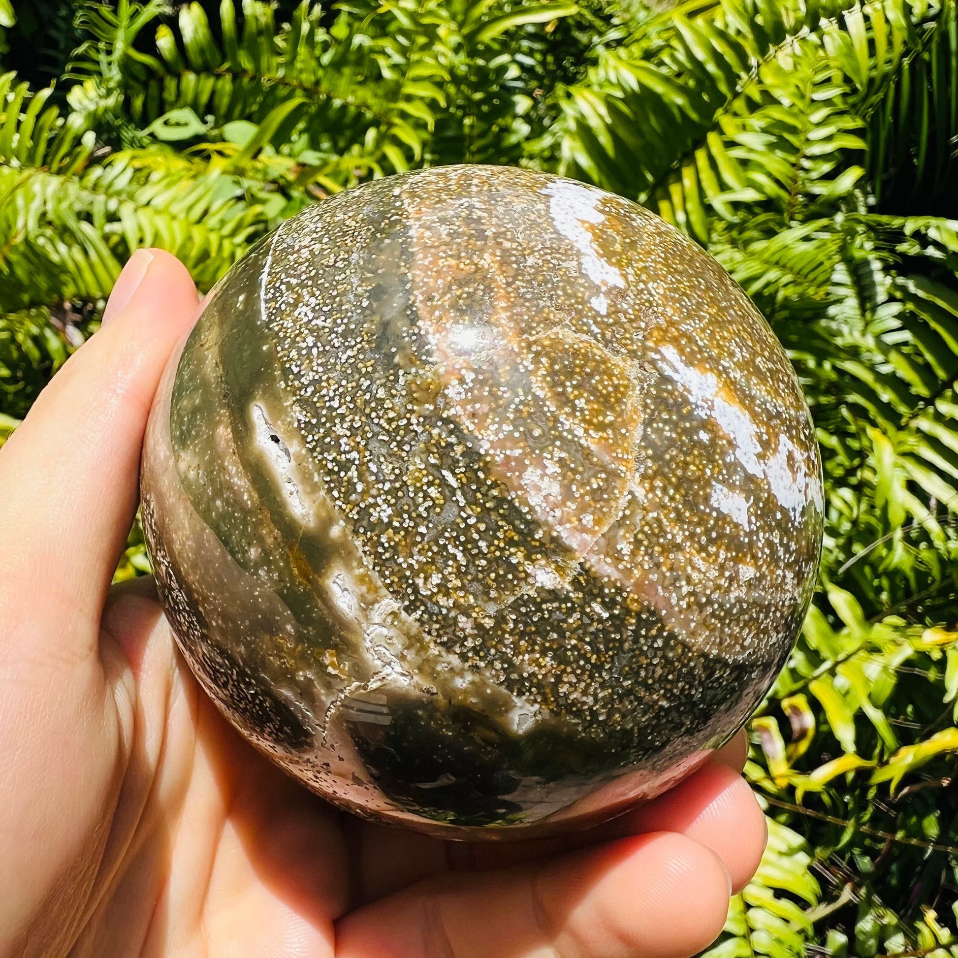 Display context of Ocean Jasper stone, in the warmth of daylight.