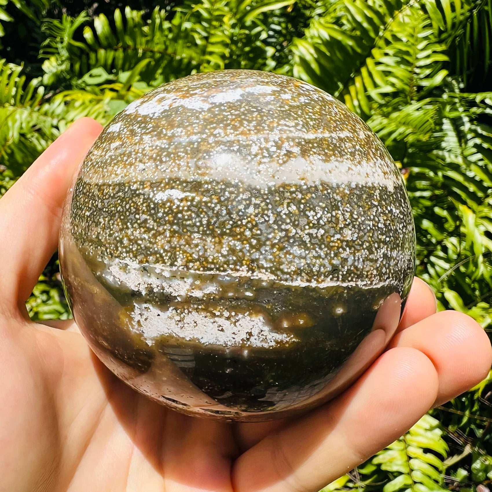Back view of Grade AA Ocean Jasper sphere showing natural surface
