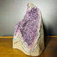 Side-on view of purple Amethyst raw geode, showing natural patina, Uruguay-sourced.