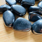 Shungite tumbled stone from Russia with Black color, polished finish for mindful calm