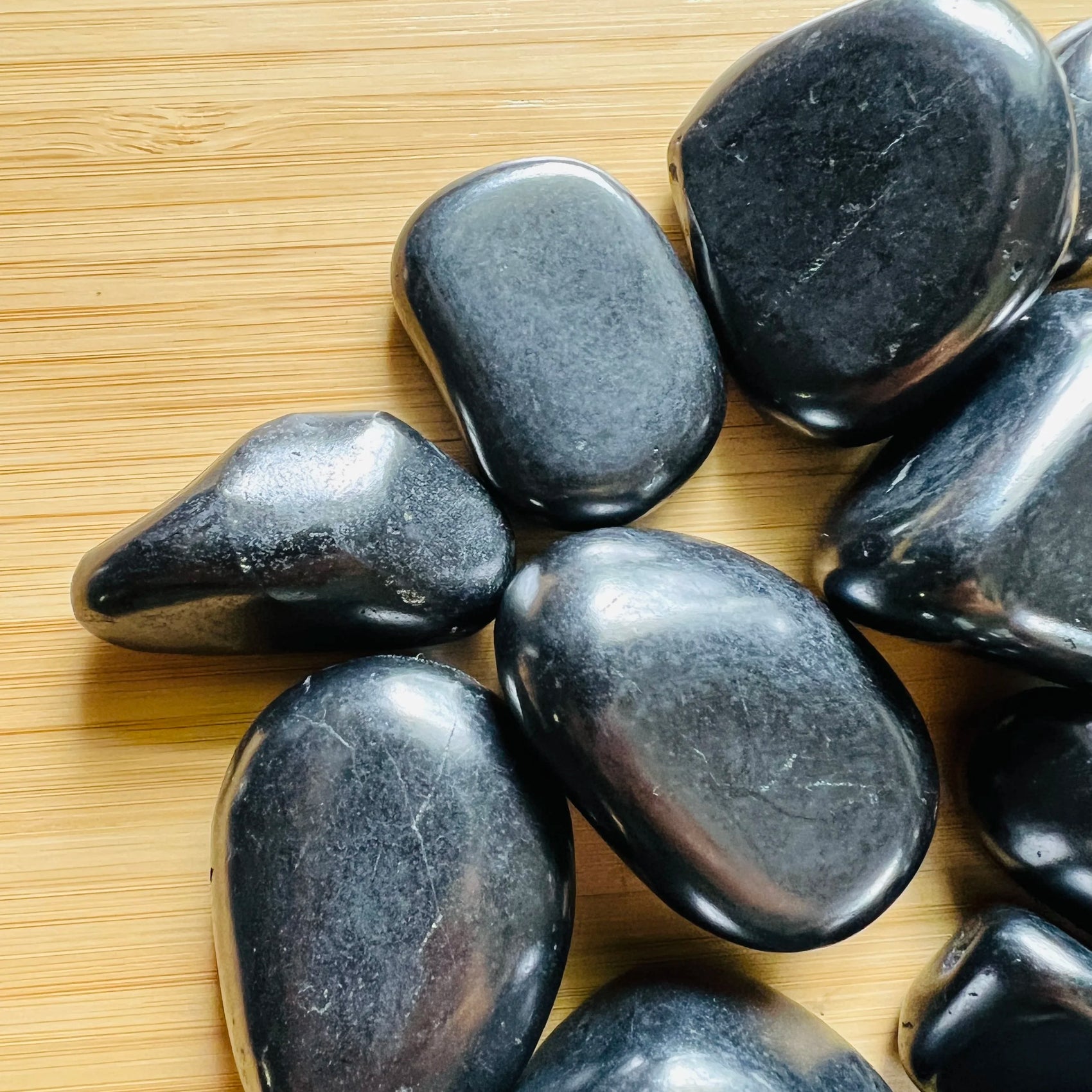Handheld Shungite tumbled stone from Russia for meditation, Stress Relief and Cleansing