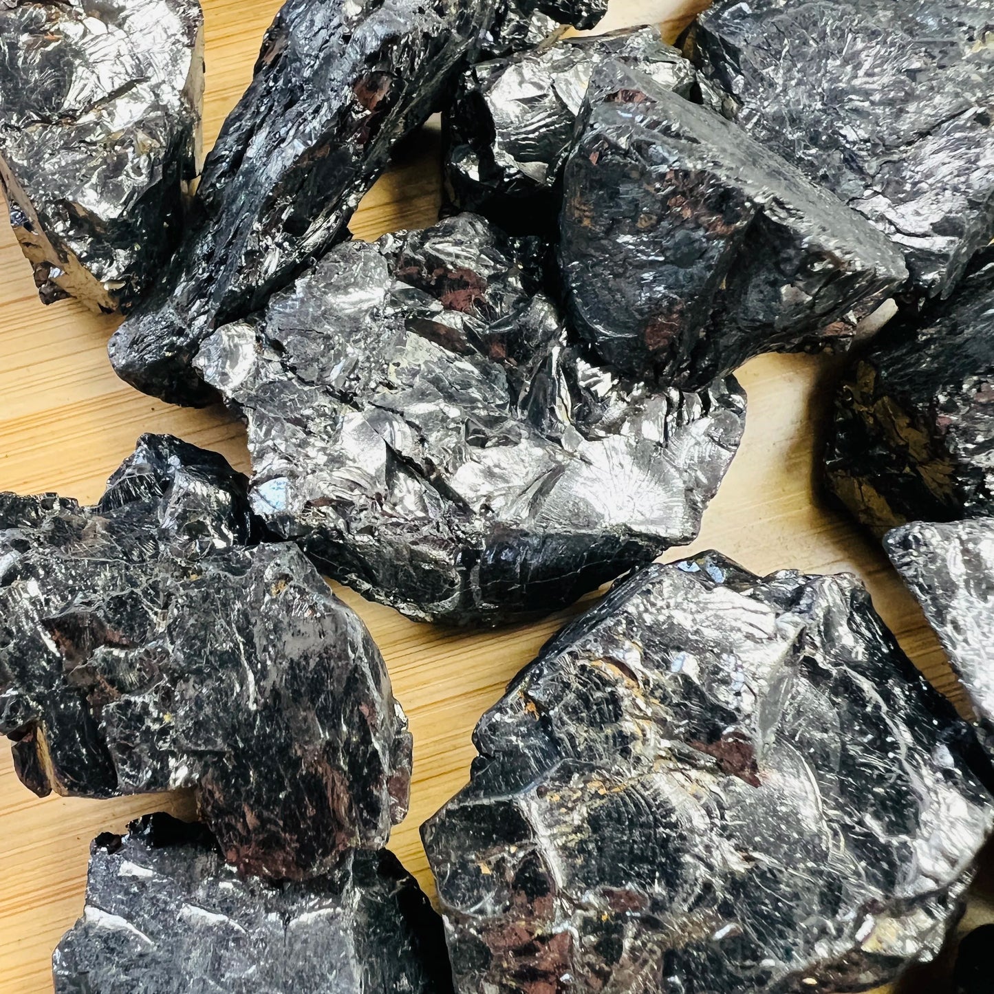 Shungite raw stone from Russia with Black color, polished finish for mindful calm