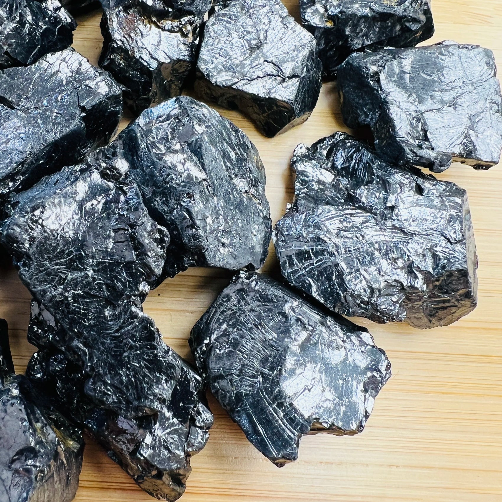 Aerial view of Shungite raw stone, hand-selected from Republic of Karélia, Russia, showing honest grain.