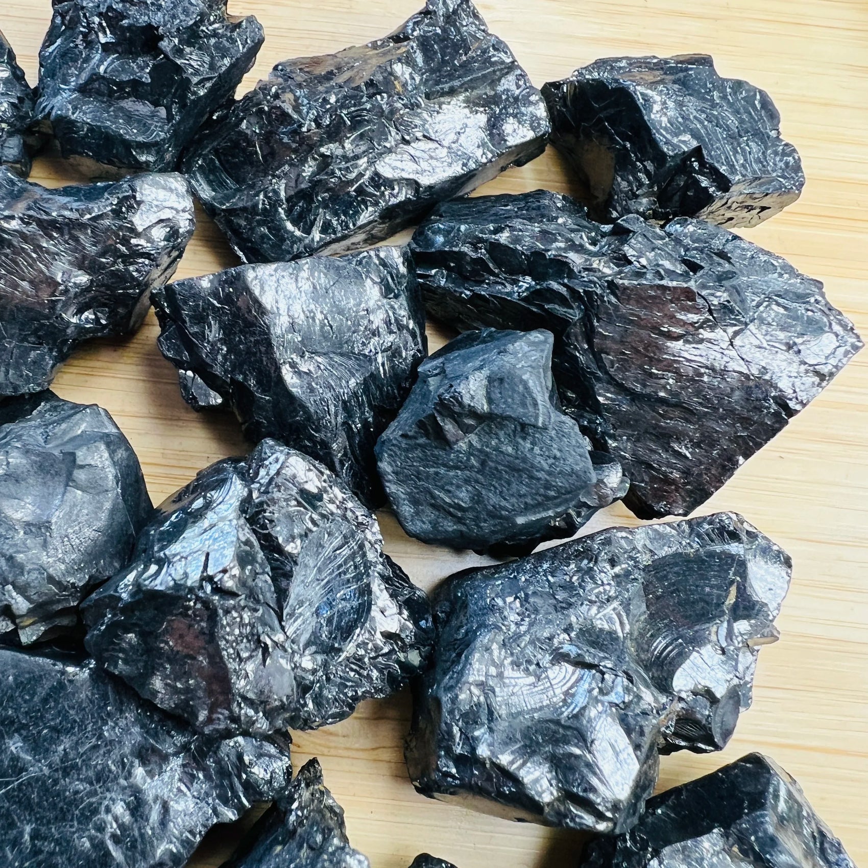 Alternate angle of Shungite raw stone, traditionally used for Protection and Cleansing, sourced from Republic of Karélia, Russia.