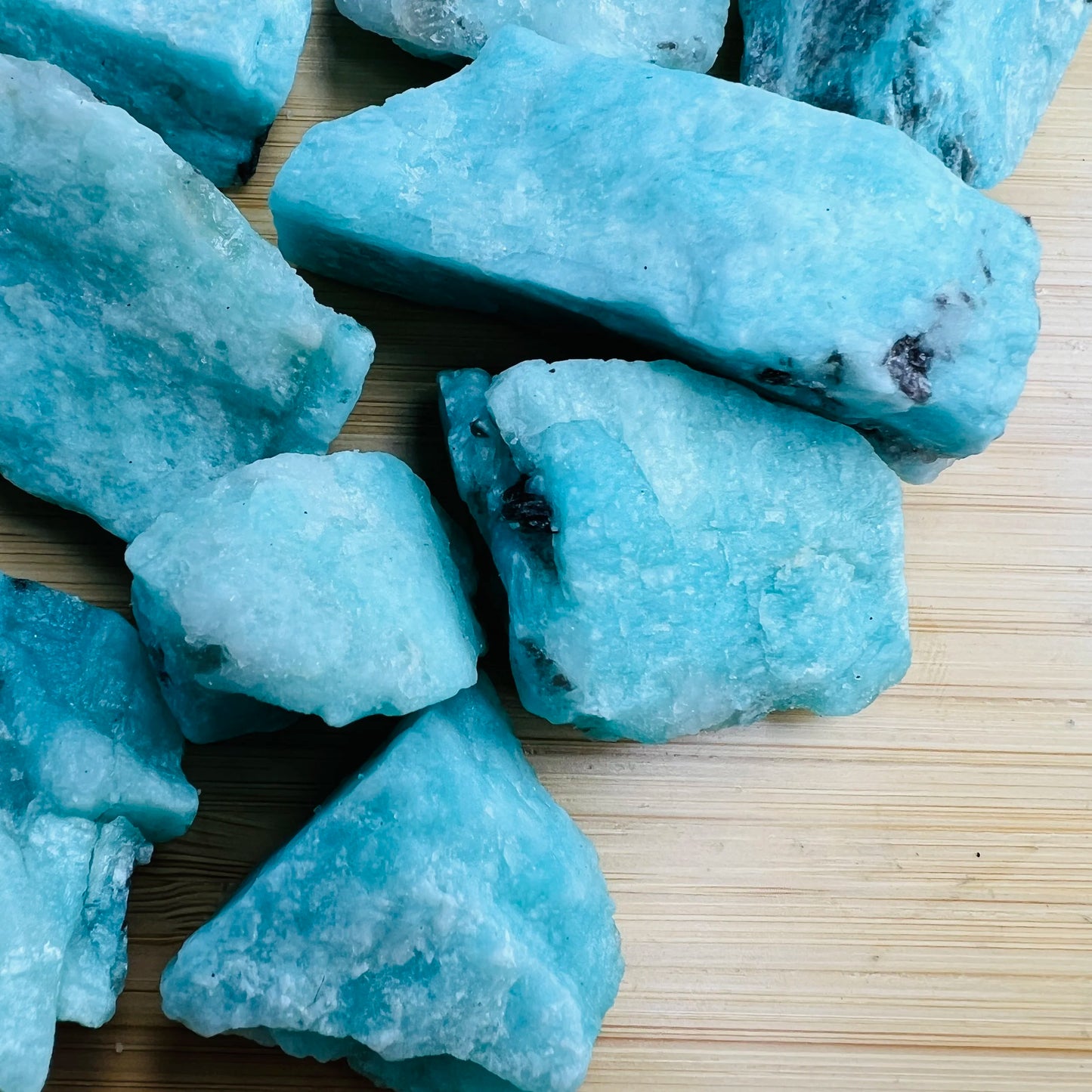 Back view of blue Amazonite raw stone, from Amboasitra, Madagascar, kept near for Stress Relief and Emotional Healing.
