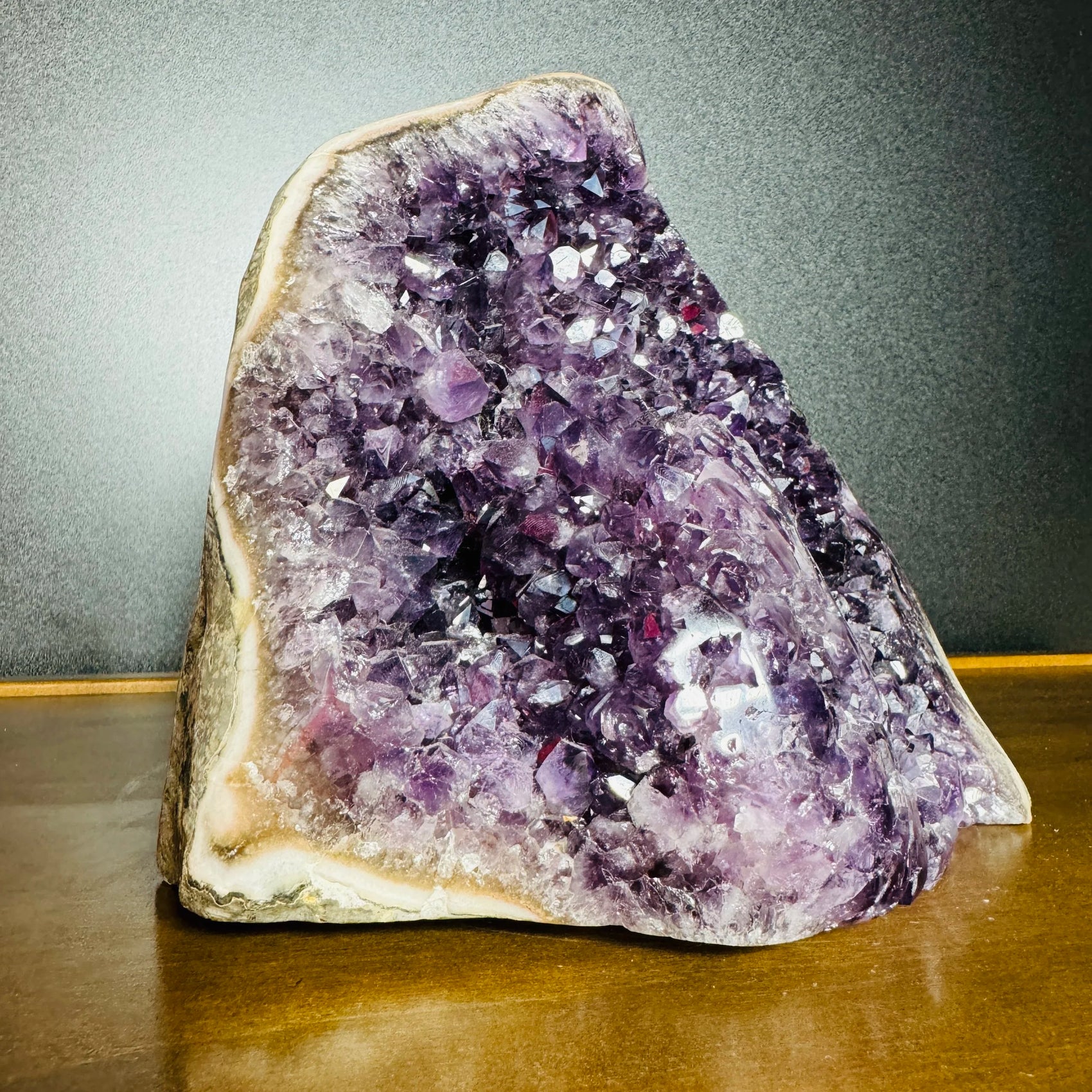 Underside detail of Amethyst raw geode, sourced from Artigas, Uruguay, showing raw matrix.
