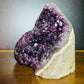 Lateral view of Grade AA Amethyst raw geode, carried for Stress Relief and Sleep, showing earthy tone.