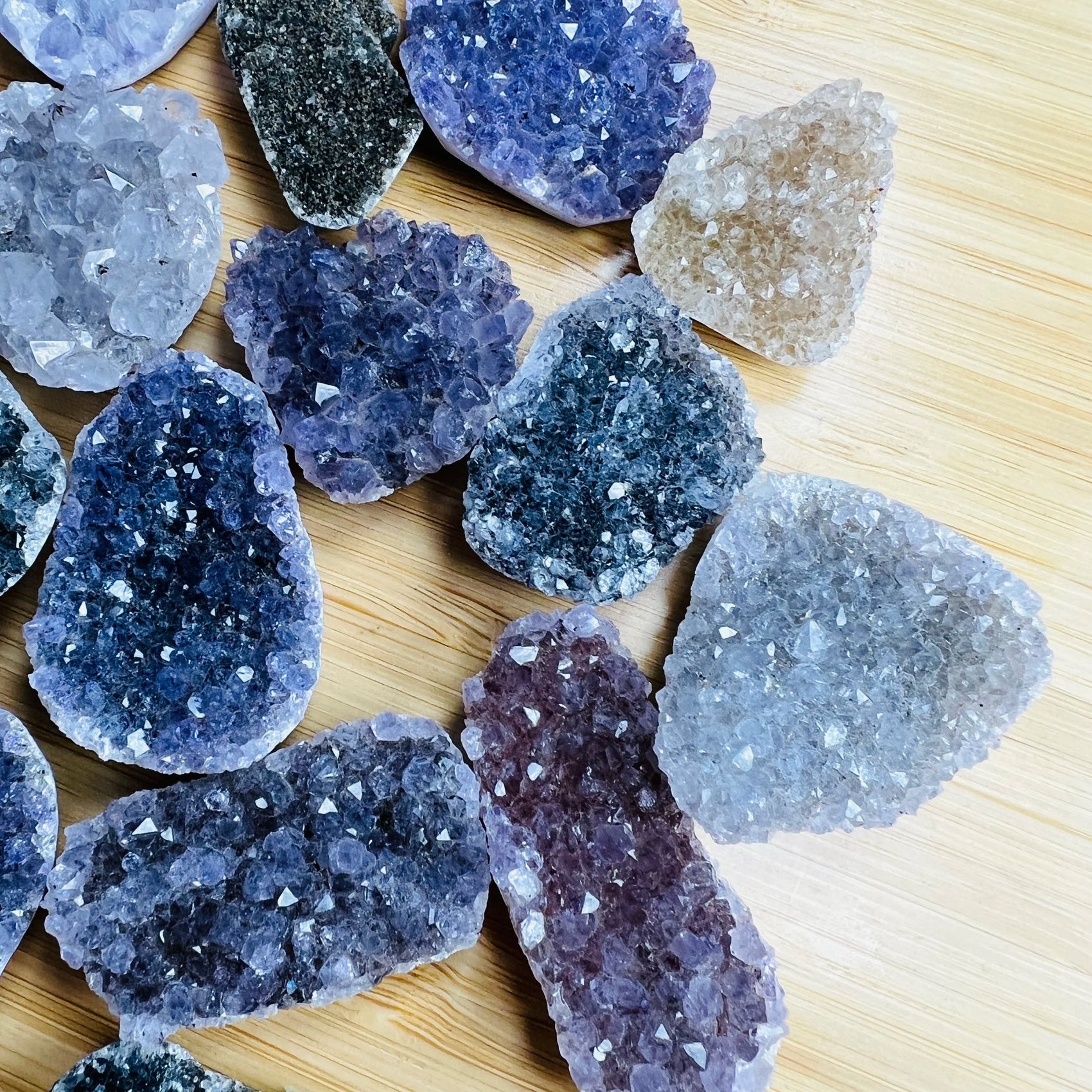 Bird's-eye view of Amethyst raw cabochon, showing natural form.