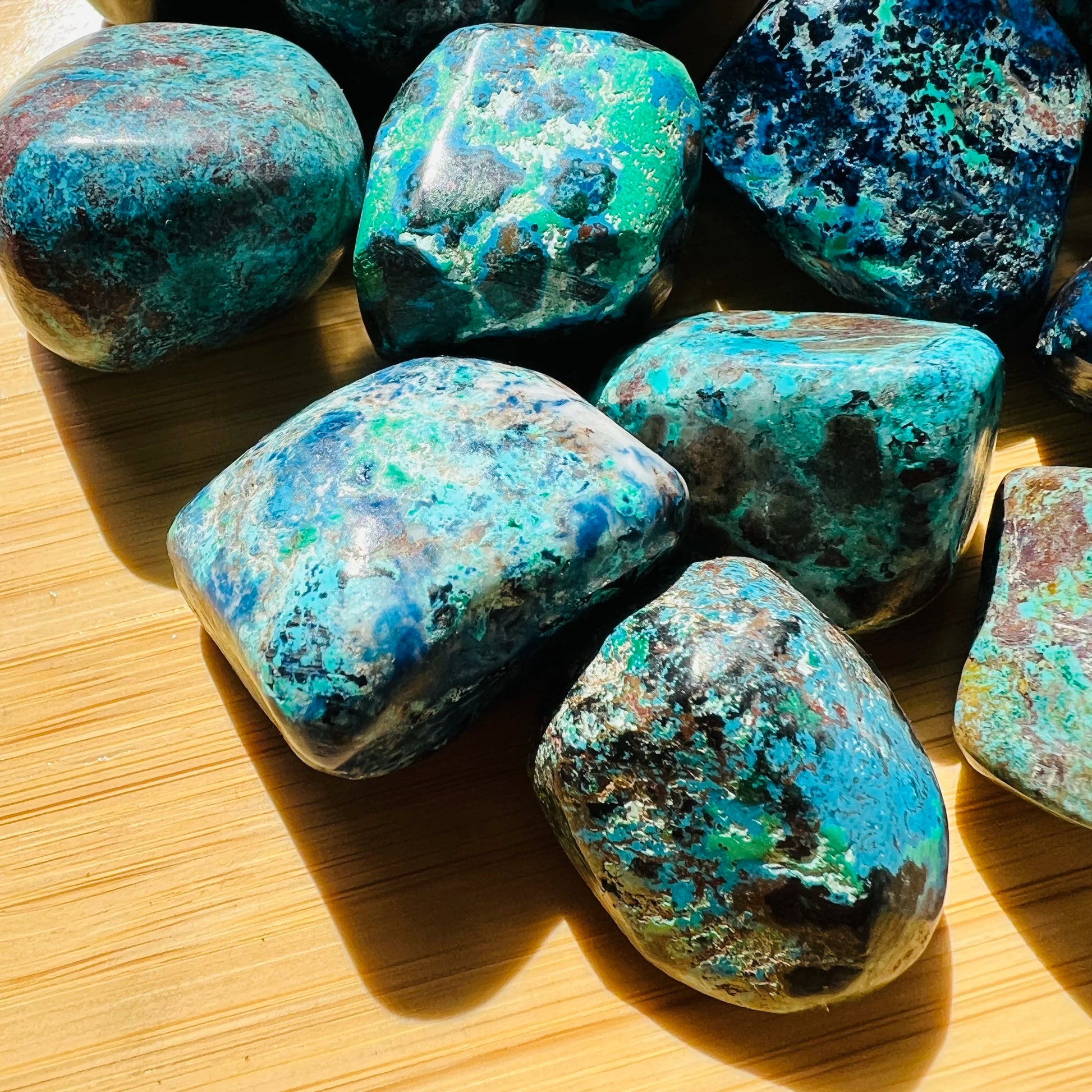 Detail shot of Grade AA Azurite tumbled stone under natural light