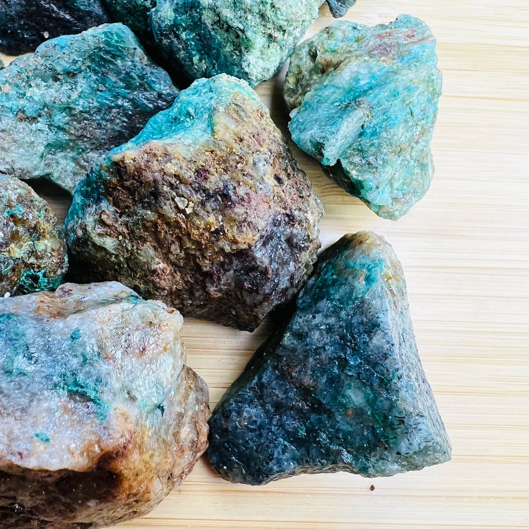Close-up of Chrysocolla raw stone from Madagascar, soothing wellness stone for Emotional Healing