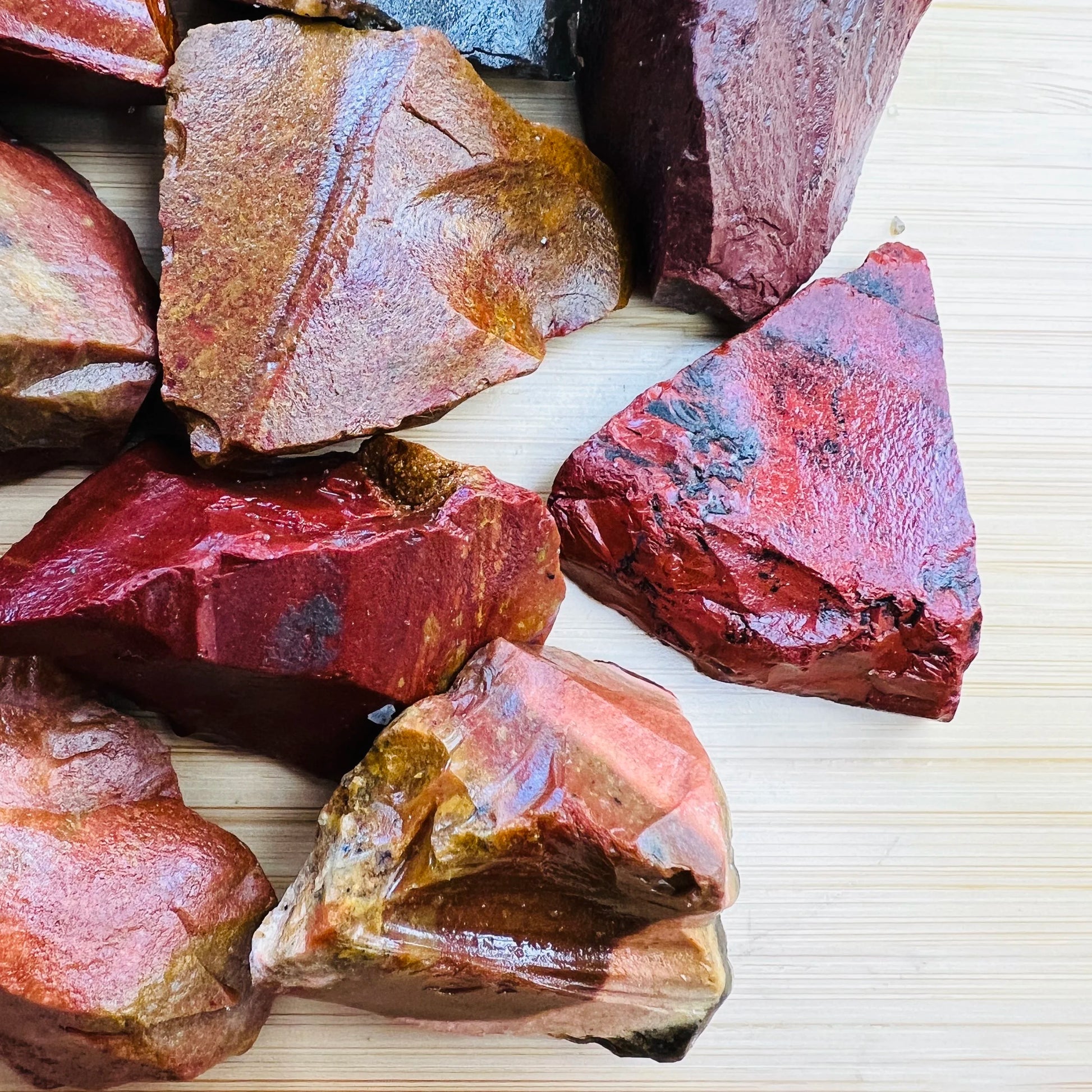 Close-up of Red Jasper raw stone from Madagascar, soothing wellness stone for Confidence