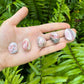 Full profile of Grade A Rhodochrosite tumbled stone ready to ship from Beyond Bohemian