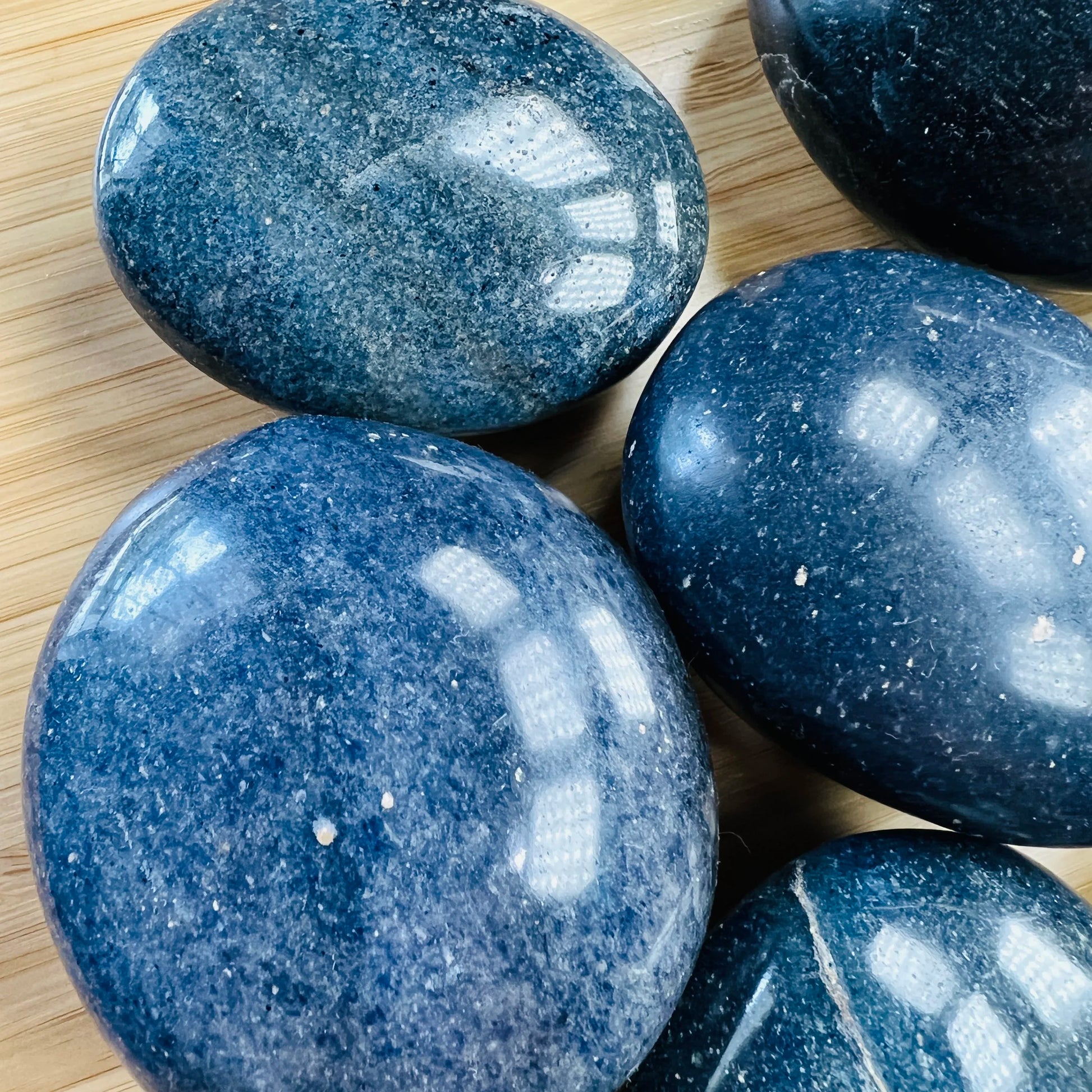 Rear view of Lazulite palm stone, showing natural texture, drawn on for Intuition.
