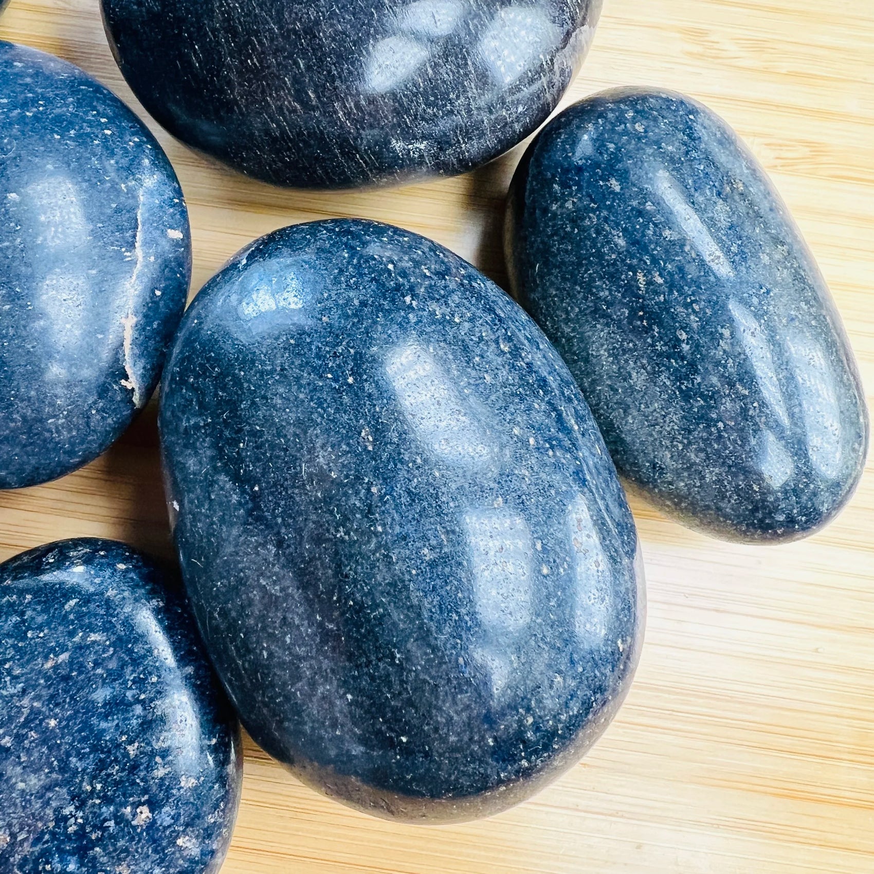 Near view of Lazulite palm stone, from Madagascar, showing natural texture.