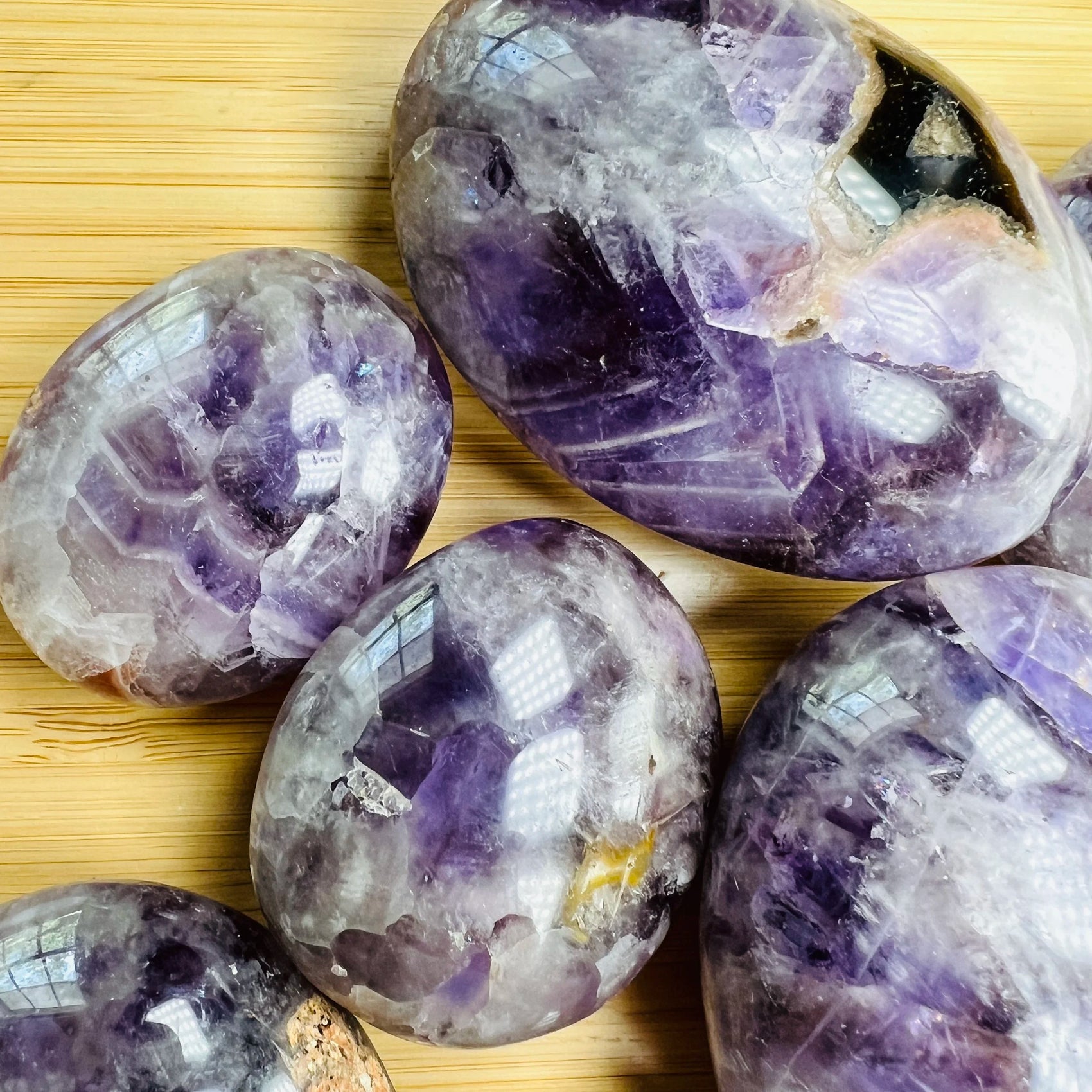 Detail of Chevron Amethyst palm stone, showing natural variation.