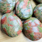 Detail shot showing Unakite palm stone, from Northern Cape, South Africa.
