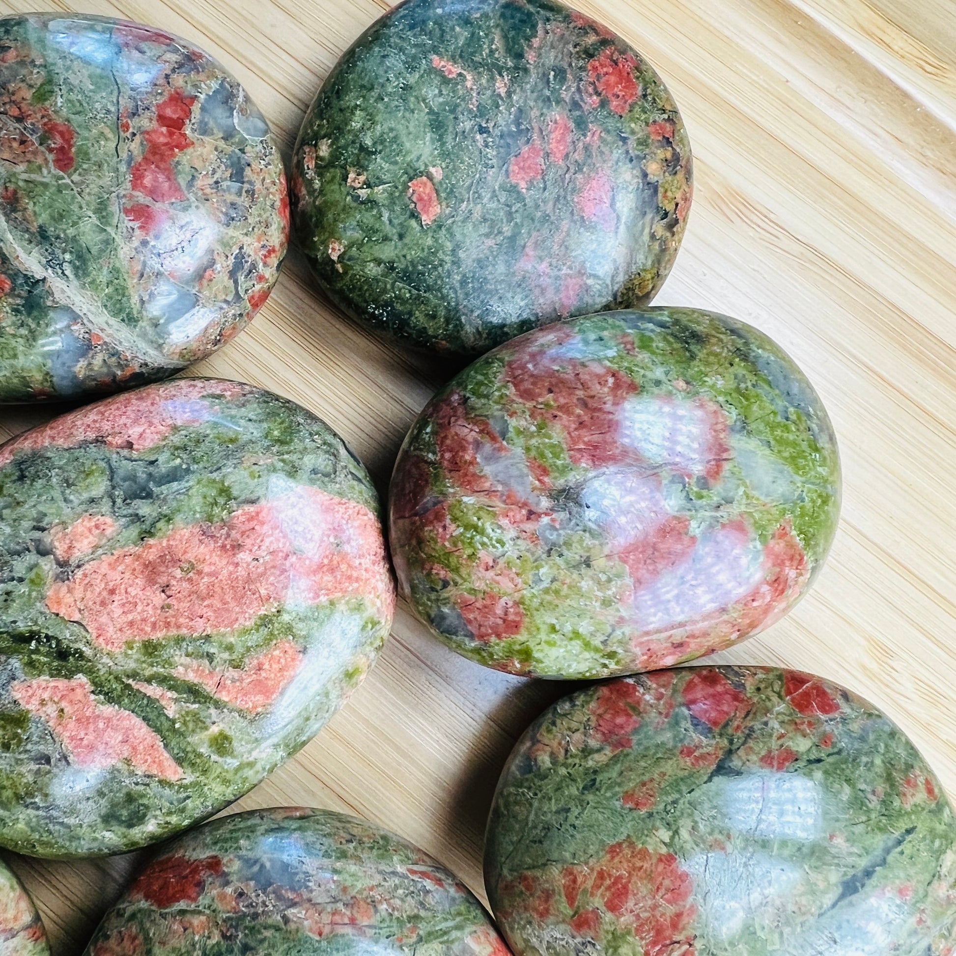 Opposite side of Unakite palm stone, sourced from Northern Cape, South Africa, often kept for Emotional Healing and Healing.