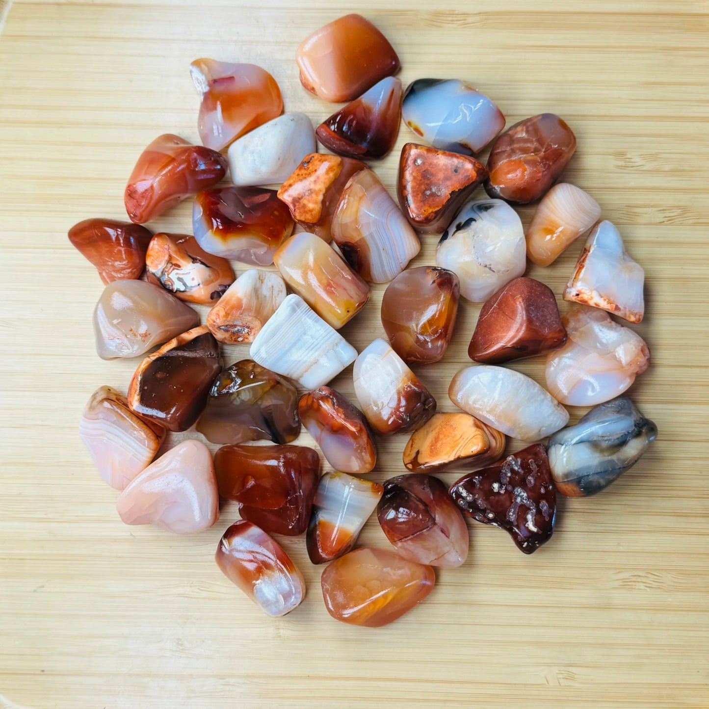 Full profile of Grade AA Carnelian tumbled stone ready to ship from Beyond Bohemian