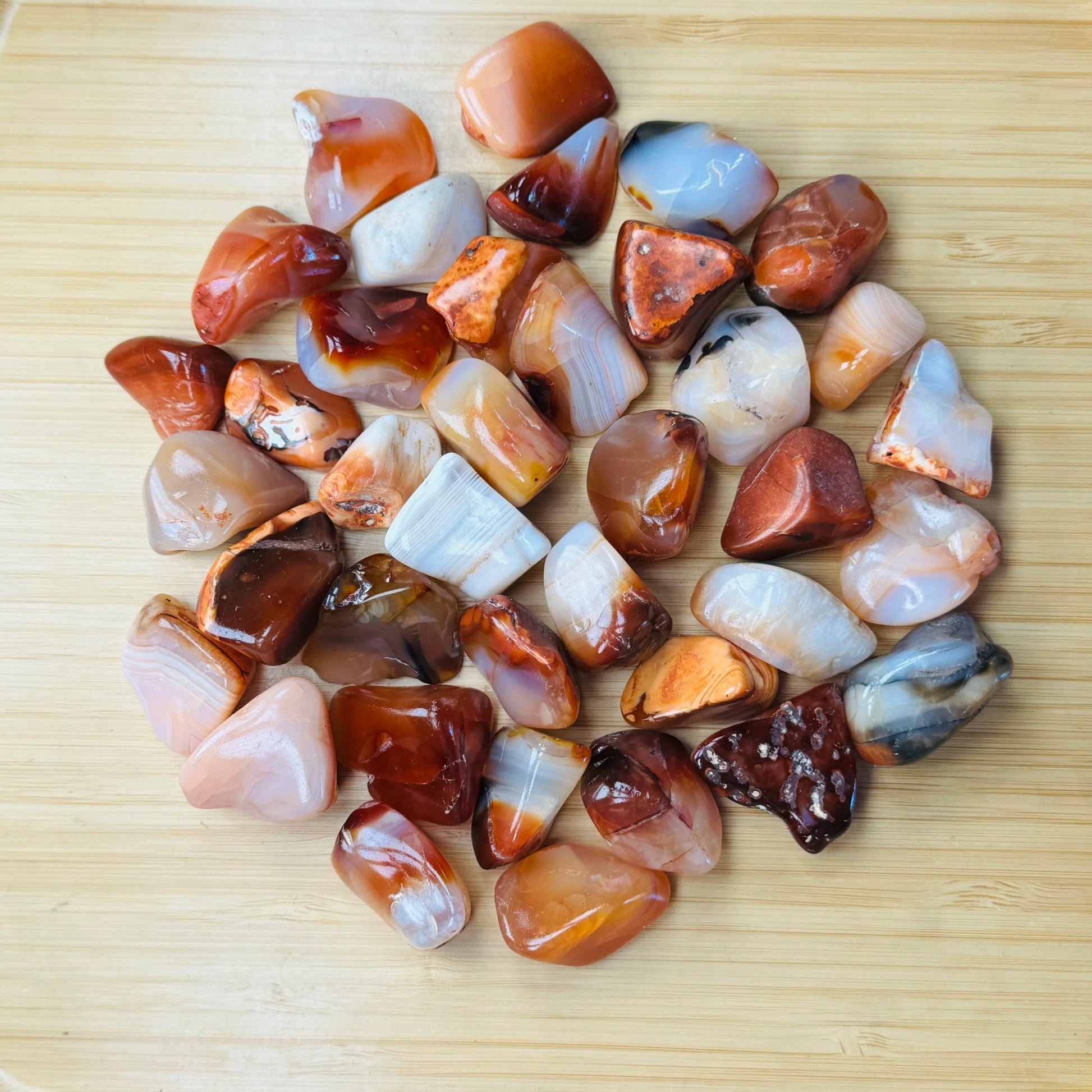 Full profile of Grade AA Carnelian tumbled stone ready to ship from Beyond Bohemian
