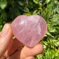 Surface detail of Rose Quartz polished heart, sourced from Vakinankaratra, Madagascar.
