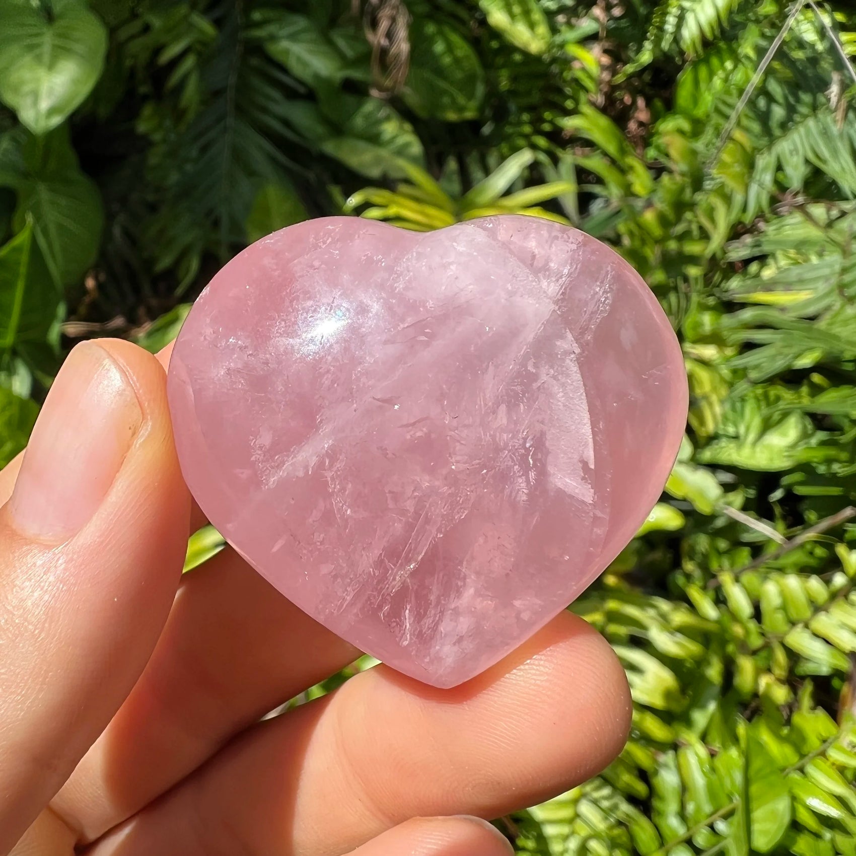 Surface detail of Rose Quartz polished heart, sourced from Vakinankaratra, Madagascar.