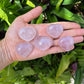 Back view of Grade AA Rose Quartz heart showing natural surface