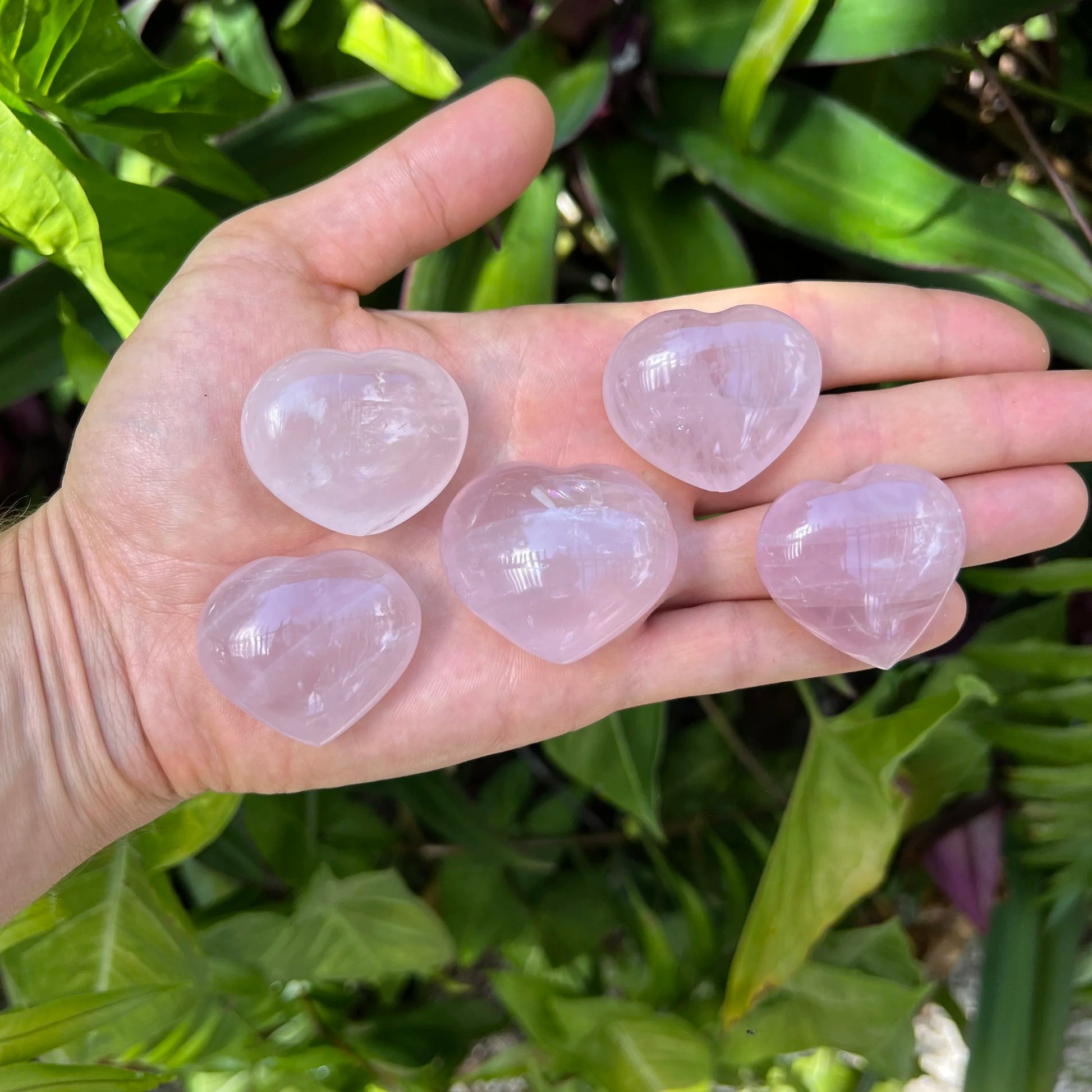 Back view of Grade AA Rose Quartz heart showing natural surface