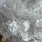 Reverse angle of Selenite polished chip, sourced from United States.