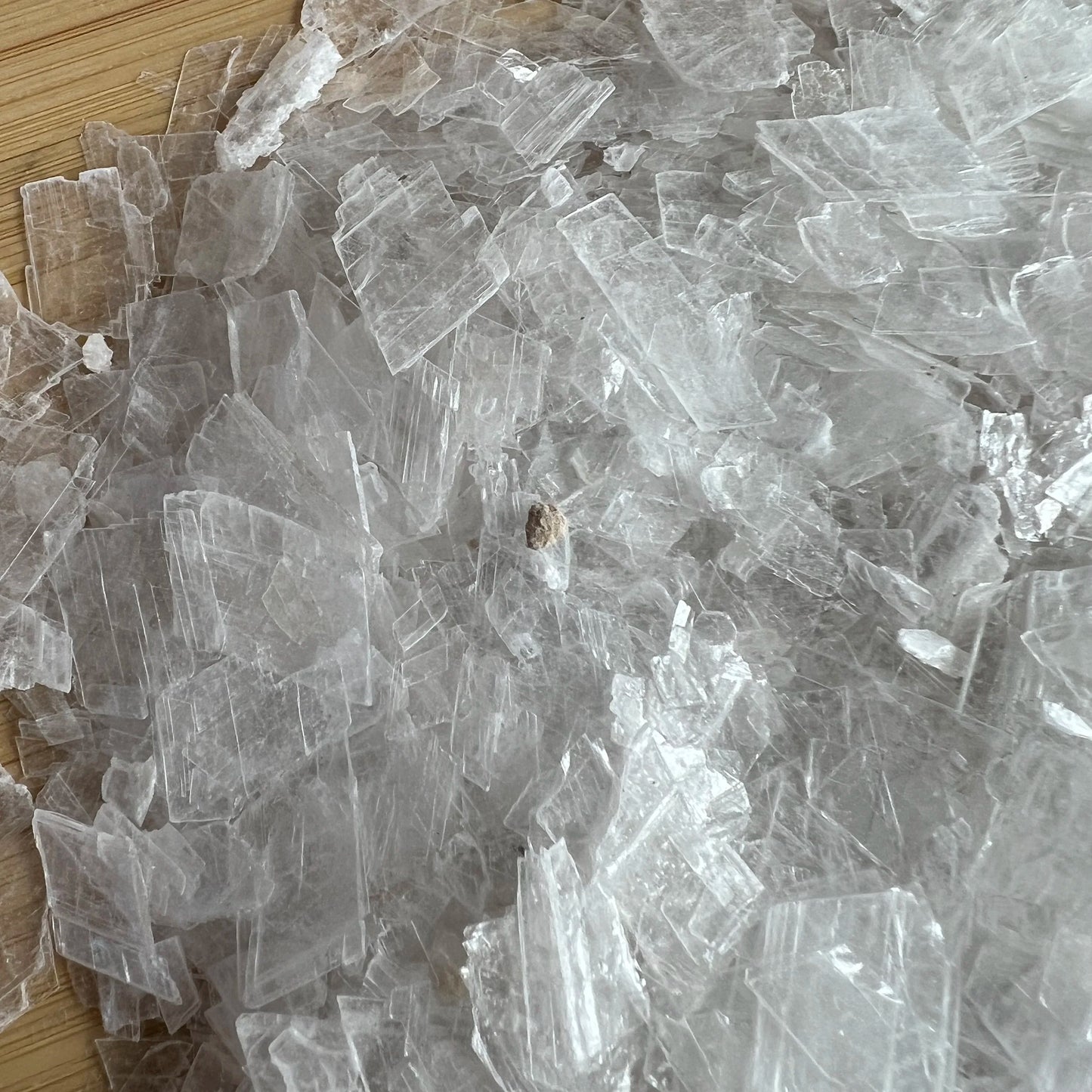 Scale reference of a Selenite polished chip traditionally used for Cleansing, United States-sourced.