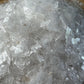Detail shot of Grade AAA Selenite crystal chips under natural light