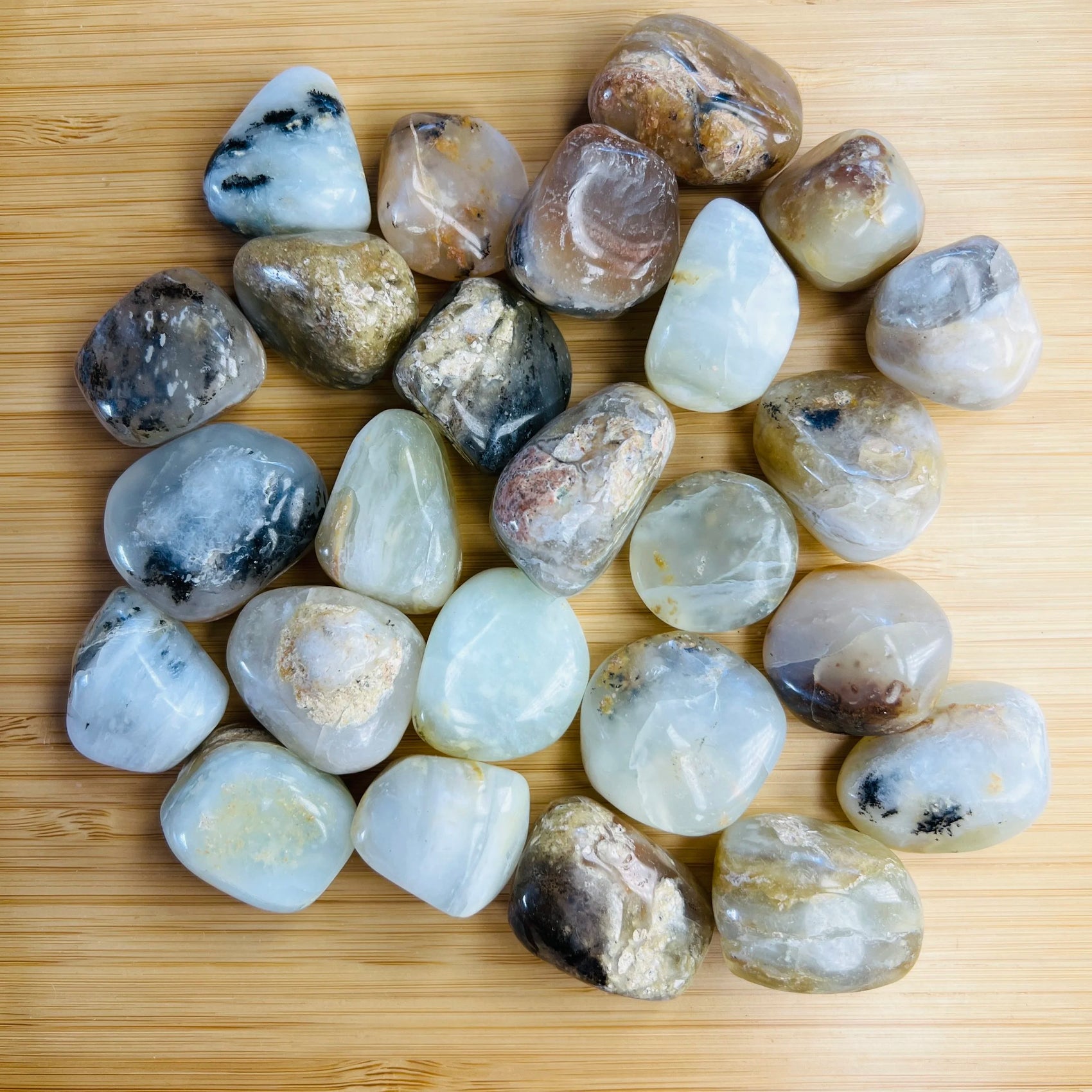 Full profile of Grade A Blue Opal tumbled stone ready to ship from Beyond Bohemian