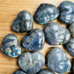 Profile shot of Labradorite polished heart, showing matte finish.