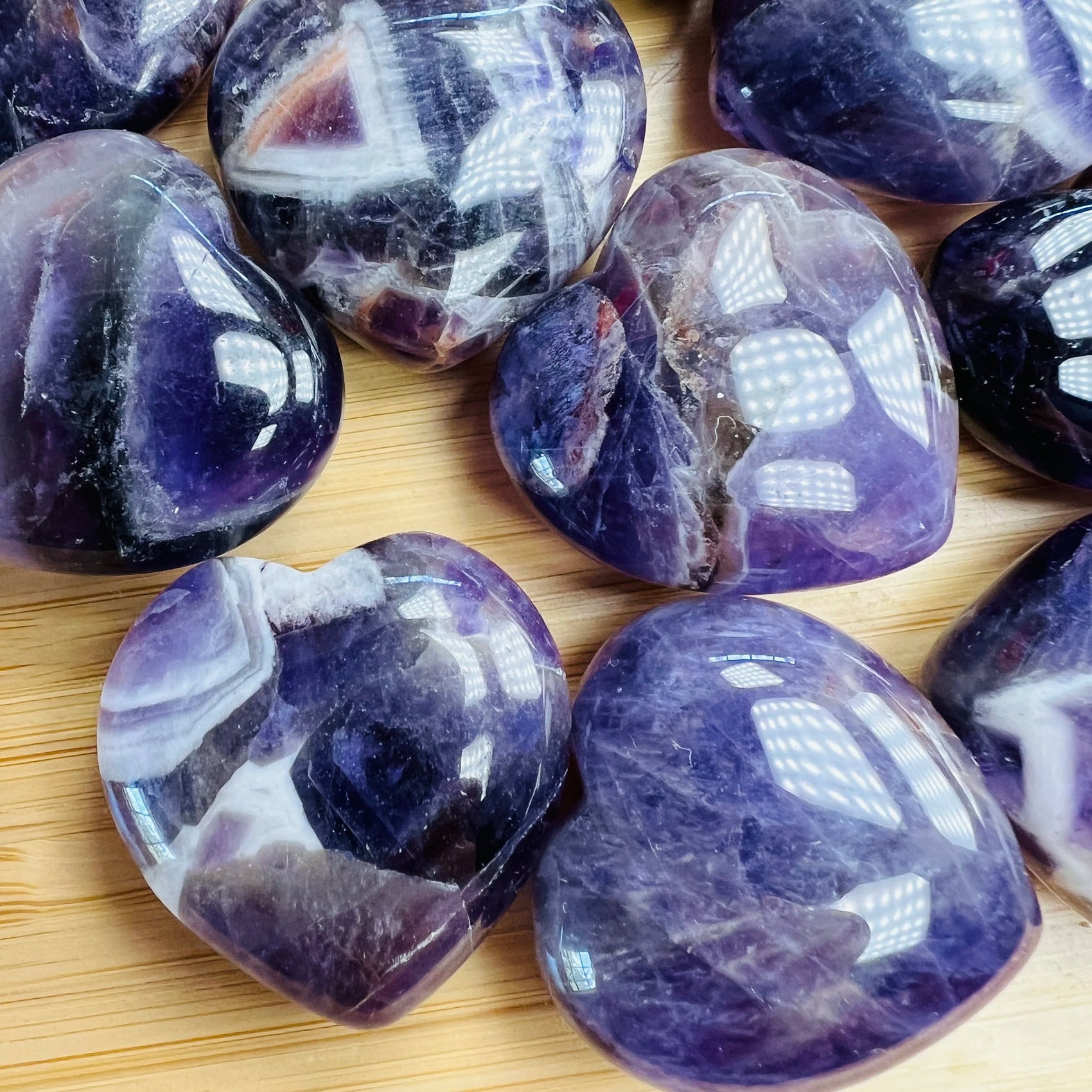 Close detail of purple Amethyst polished heart, from Analamanga, Madagascar.